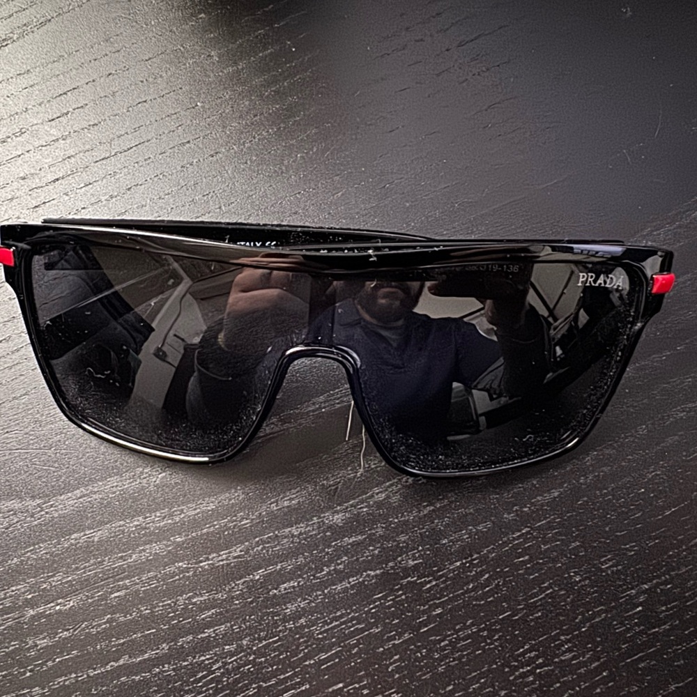 Prada Black Sunglasses with Red Highlights